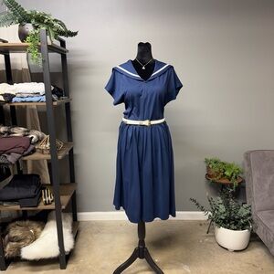 Elegant Navy Blue Dress with White Accents